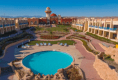4 star deluxe beach resort along with a large attached vacant plot.