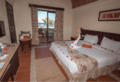 4 star deluxe beach resort along with a large attached vacant plot.